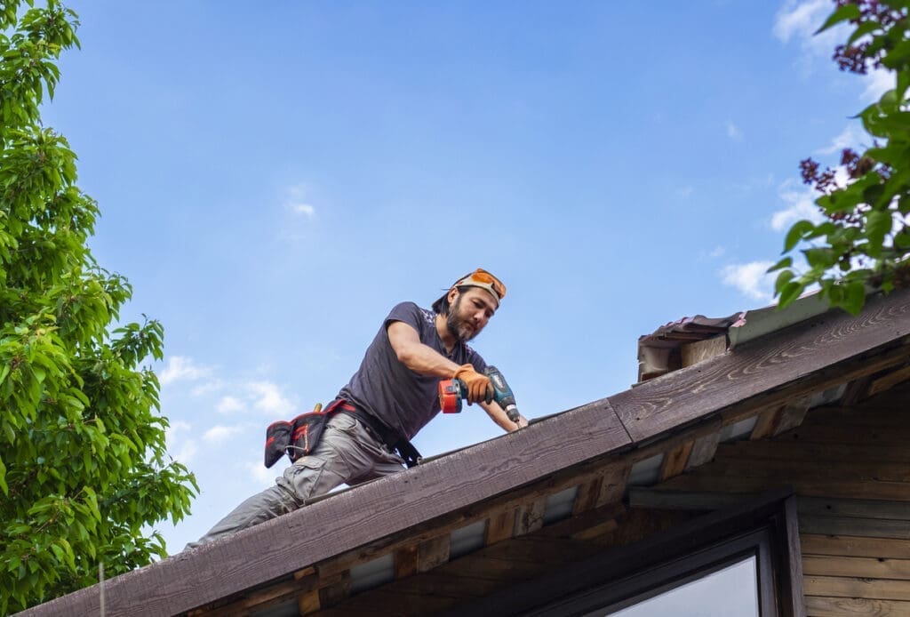 Contractor installing new roof